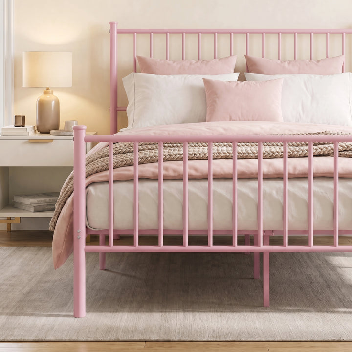 [Pink | Double] Metal bed front close-up view of pink bar footboard, tall headboard, pink-white bedding & centre support legs