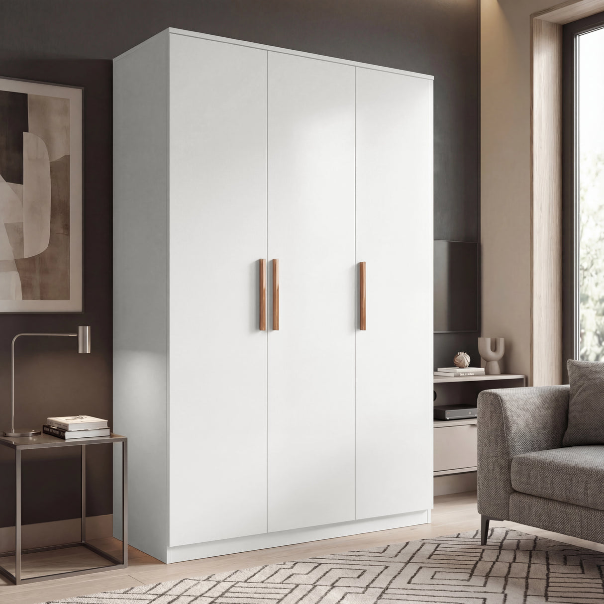 [White]  Three door plain white wardrobe in room setting with wooden handles and doors closed placed in a natural light