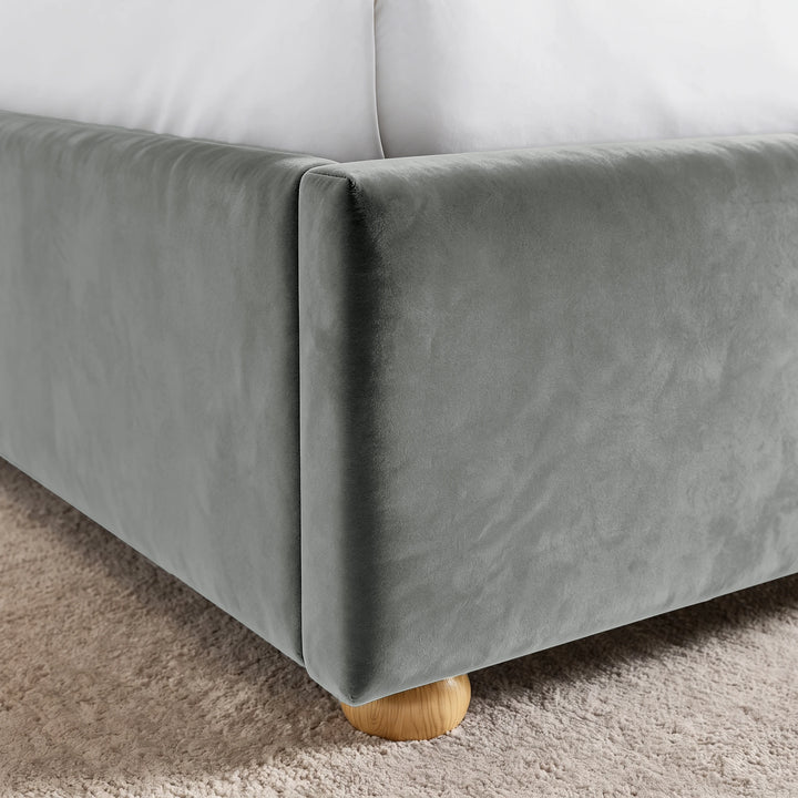 [King | grey] Close-up showing plush velvet footboard, side rail and raised wooden foot
