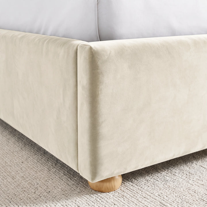 [King | Beige] Close-up showing plush velvet footboard, side rail and raised wooden foot