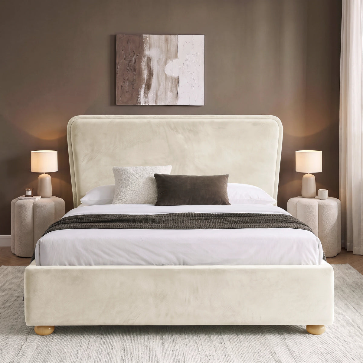 [King | Beige] Front view of plush velvet ottoman bed with wide 120cm padded headboard, with wooden legs on footboard