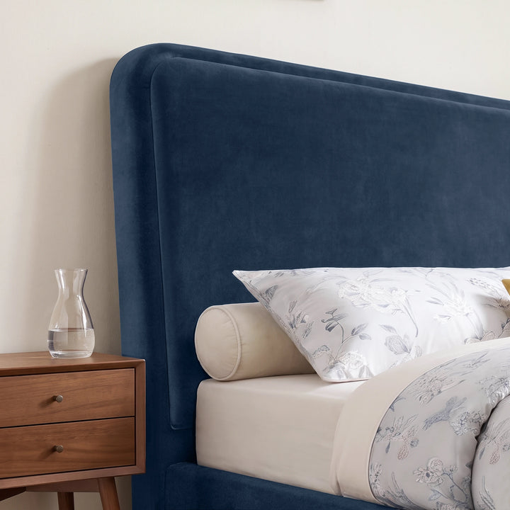 [King | Blue] Closeup of 10cm thick sandwich headboard with a section of 6cm thick padding upholstered with soft velvet