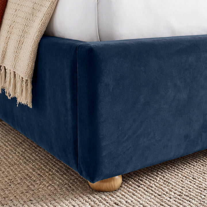[Double | Blue] Close-up showing plush velvet footboard, side rail and raised wooden foot