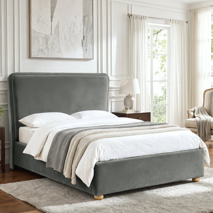 [Double | Grey] Angled lifestyle view of the Plush Velvet Ottoman Double Bed Frame - Grey in an elegant modern bedroom.