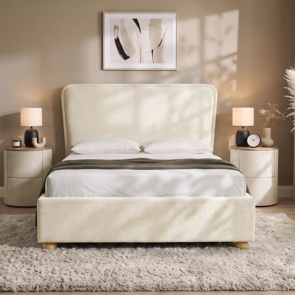 [Double | Beige] Front view of plush velvet ottoman bed with wide 120cm padded headboard, with wooden legs on footboard