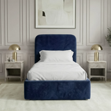 [Single | Blue] Symmetrical front-on view of Pluva velvet bed with rounded headboard and art centred above