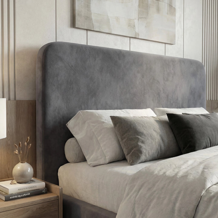 [King | Grey] Close-up of Pluva curved velvet headboard showing smooth padded upholstery and rounded top edge