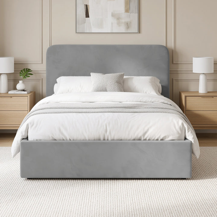 [Double | Light Grey] Front-on bedroom view with rounded headboard, white bedding, matching bedside tables and wall art