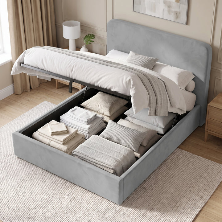 [Double | Light Grey] Ottoman base raised on gas struts showing pillows, folded sheets, cushions and blankets stored inside