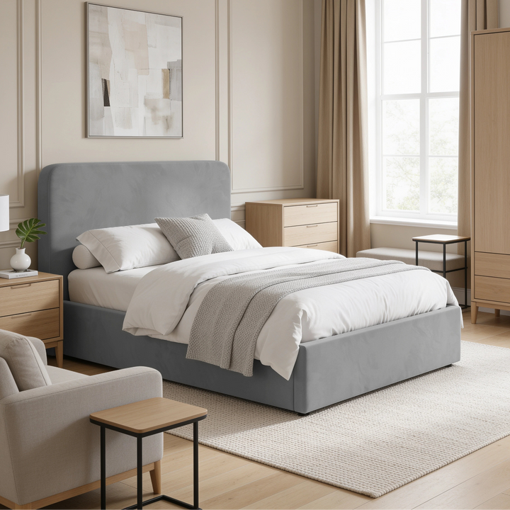 [Double | Light Grey] Wide bedroom setting with rounded headboard, wooden wardrobe, chest, armchair and tall window