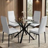 [White | Set of 4] PU leather dining chairs set around a glass table in a bright dining room