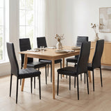[Black | Set of 6] PU leather dining chairs set around a wooden table in a bright dining room