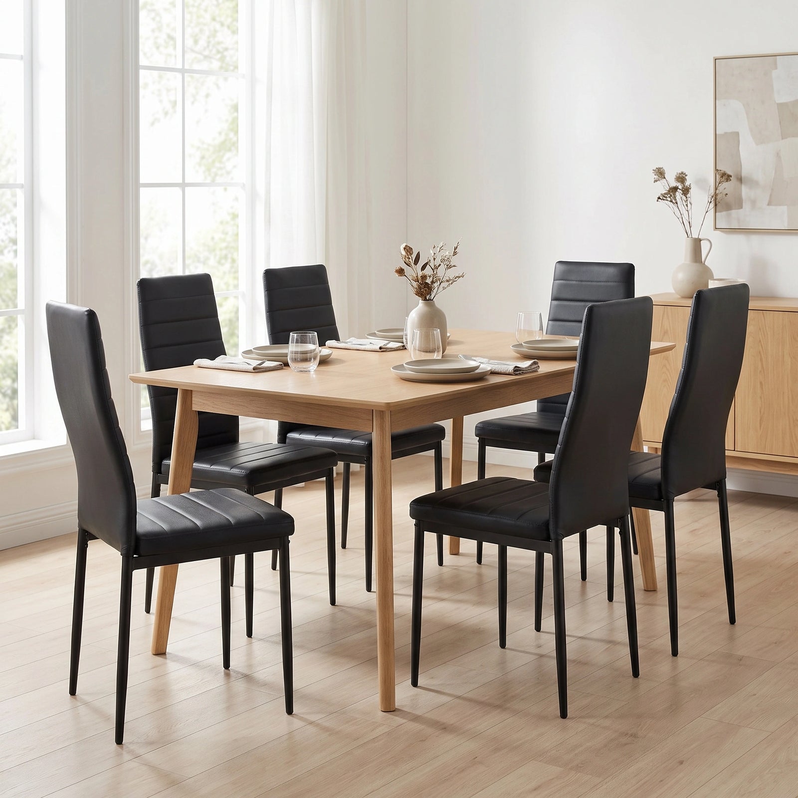 [Black | Set of 6] PU leather dining chairs set around a wooden table in a bright dining room