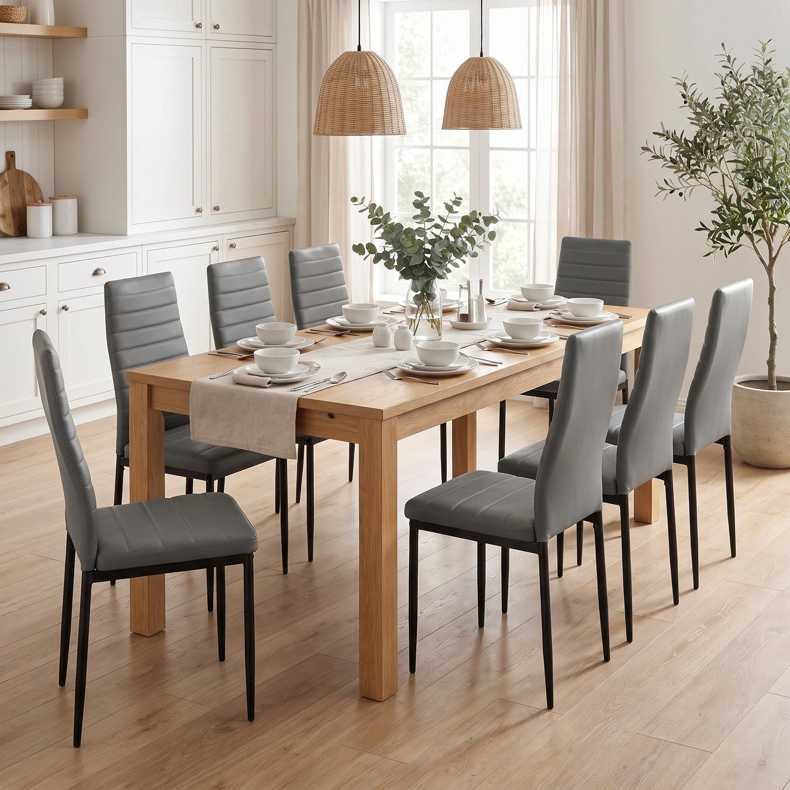 [Grey | Set of 8] PU leather dining chairs set around a wooden dining table in a bright dining room