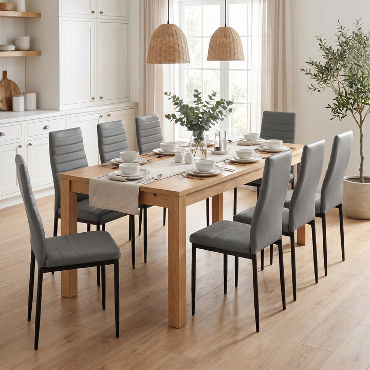 [Grey | Set of 8] PU leather dining chairs set around a wooden dining table in a bright dining room