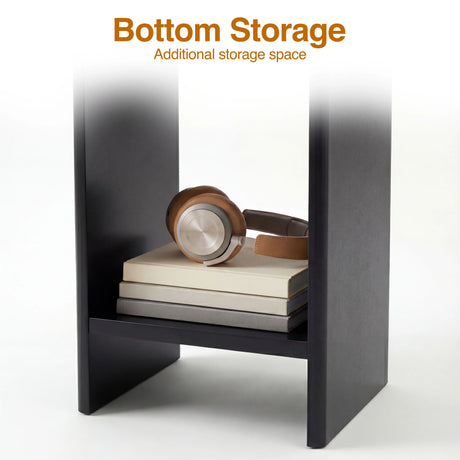 [Black] Bottom storage shelf of black round side table holding brown headphones on two stacked books