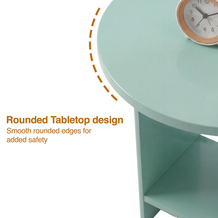 [Sage Green] Rounded tabletop edge close-up of sage green round side table with rose-gold clock on surface