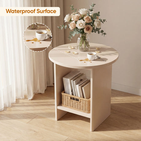 [Taupe] Waterproof surface detail of taupe round end table holding cream roses above books and wicker basket