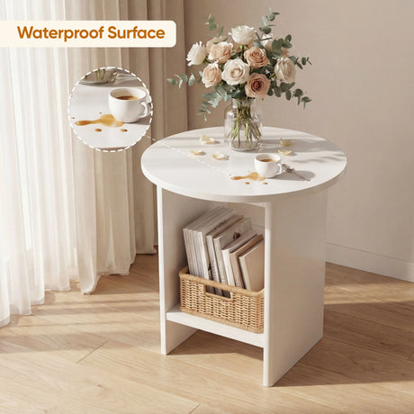 [White] Waterproof surface detail of white round end table holding vase of cream roses above books and wicker basket