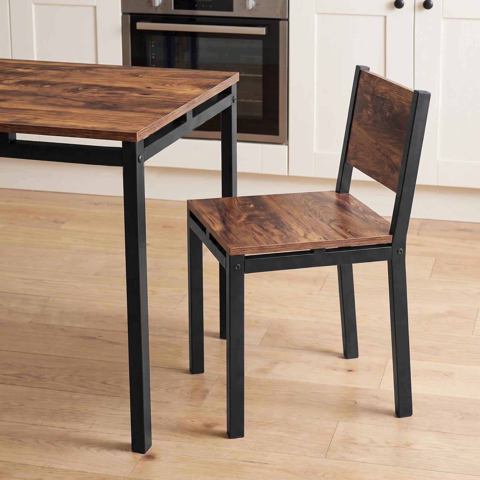[Rustic] Breakfast table and chair close-up view with rustic panels, black metal frames, open support rails and visible bolts