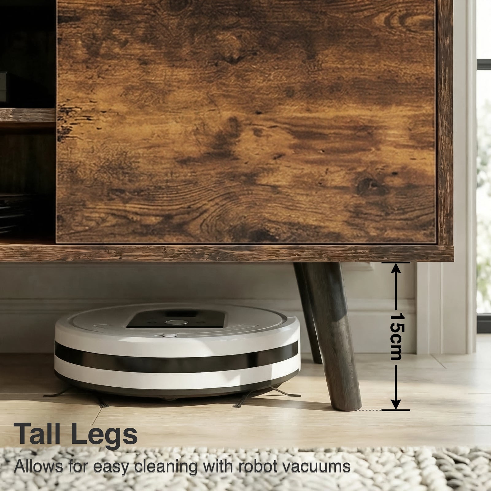 [Rustic] Larvik TV unit close-up of left cabinet door distressed-grain front beside tapered black leg with flooring below