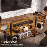 [Rustic] Zelumi TV cabinet showing open shelf storage with blue LED lighting and person placing gaming console into the right side compartment