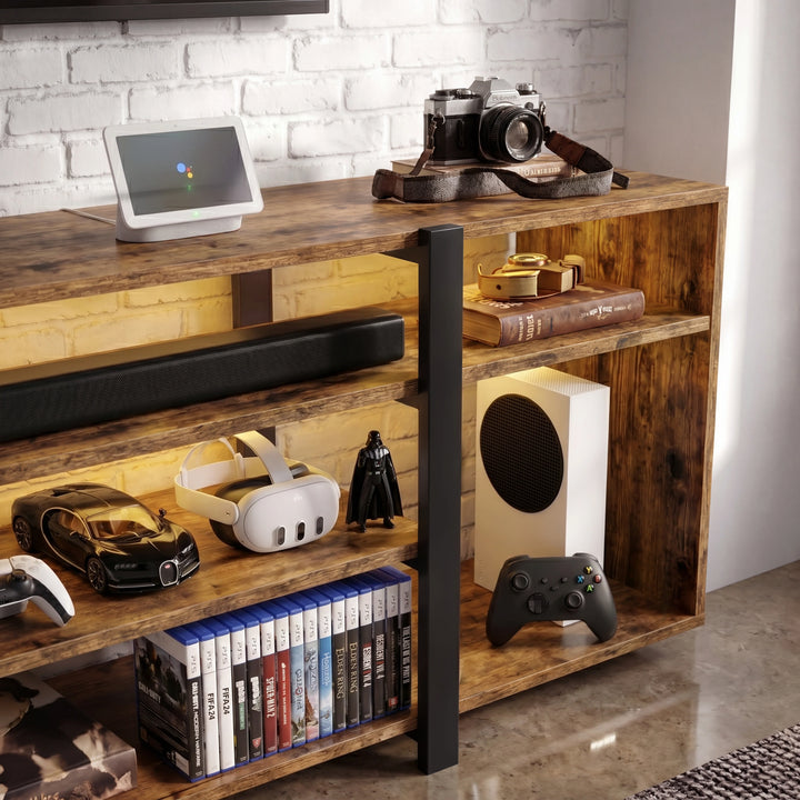 [Rustic] Zelumi TV cabinet right-side close-up with warm LED-lit shelves holding console, VR headset, soundbar, game cases, and collectibles