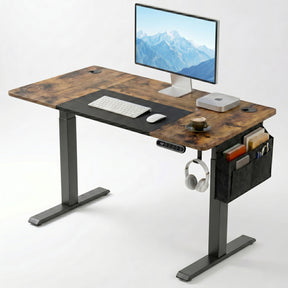 [110cm x 60cm] Rustic Electric Standing Desk with dark wood top and black frame, monitor, desk mat, side organiser, and headphone hook