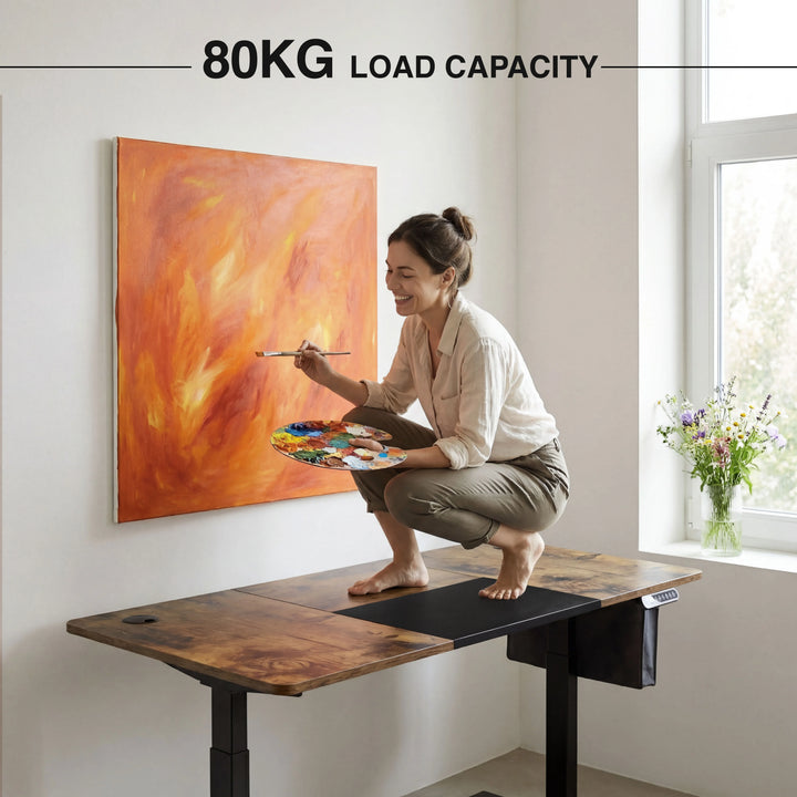 [140cm x 60cm] Person on top of 140cm rustic standing desk painting a flame canvas, 80KG load capacity shown