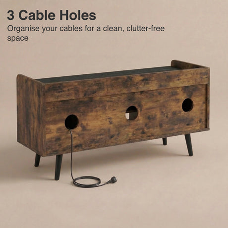 [Rustic | 112 cm] Larvik rear panel showing three cable management holes with power cord threaded through on beige background