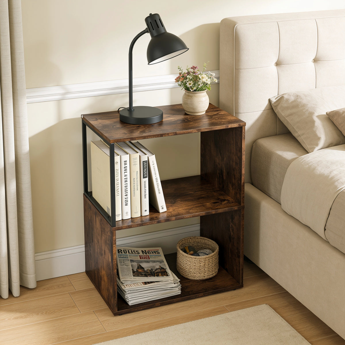 [Rustic] This narrow side table stands beside a bed with a lamp, books and a basket on its open shelves.
