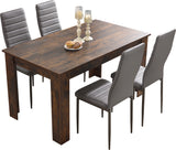 Rustic oak dining table with natural wood finish, perfect for cozy and inviting dining spaces.