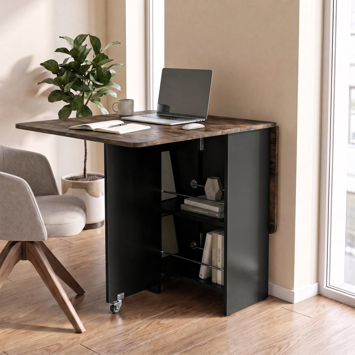 [Rustic] Compact folding dining table used as a desk with one wood-effect leaf raised and rod-fronted side shelves in view.