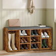[Rustic] Rustic shoe storage bench angled view with handbag and books on grey padded seat