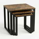 [Rustic] Stackora set of 3 nesting tables from front angle showing all three graduated tabletops nested within each other