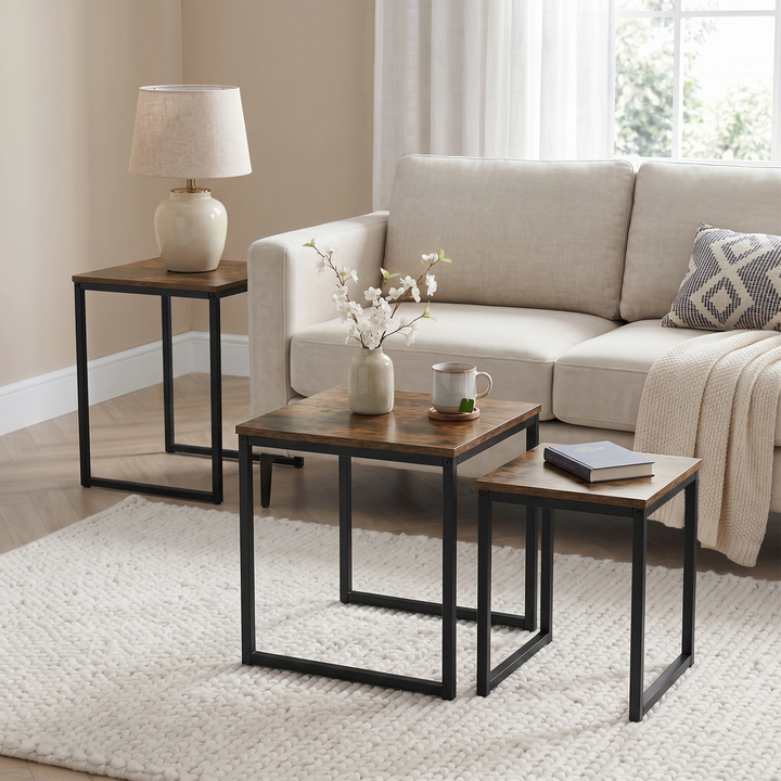 [Rustic] Stackora nest of tables set of 3 used separately across a living room as side table, coffee table, and accent table with lamp and flowers