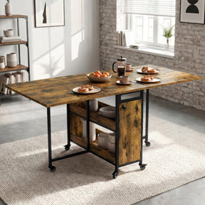 [Rustic] Kitchen & Dining Furniture Sets open drop leaf dining table with plates, cups, fruit, and centre storage.