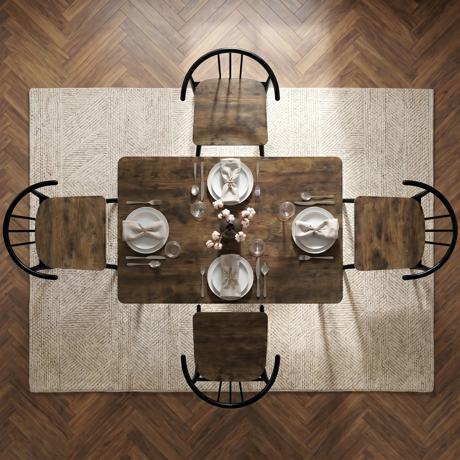[Rustic] Torvi 4 seater dining set bird's-eye view fully laid with plates, cutlery, glasses and napkins on a textured rug over dark wooden floor