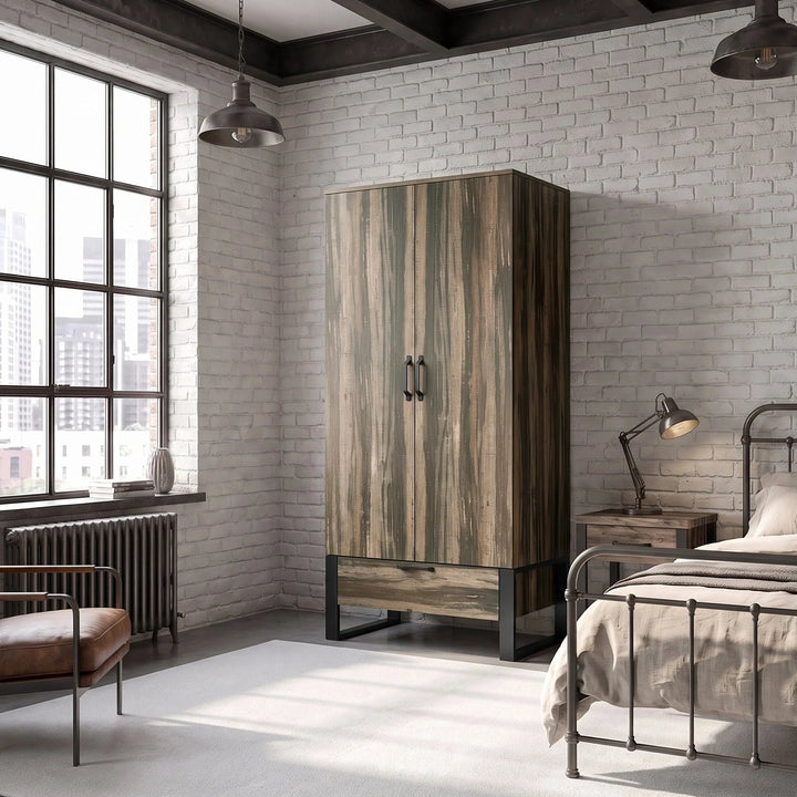[Rustic Dark Wood]  wardrobe with two doors and black handles stands in a modern loft-style bedroom with white brick walls, a large window, a metal bed, and a brown leather chair.