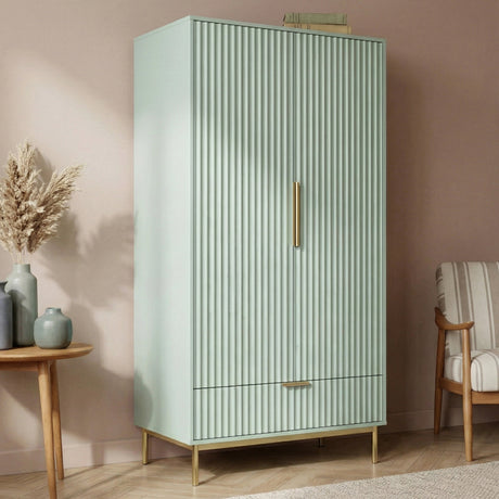 [Sage Green] double door wardrobe cabinet with vertical surface pattern and golden finish, metal handles, and legs