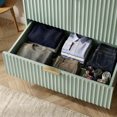 [Sage Green] wardrobe drawer interior layout with clothing storage organisation and golden finish metallic handle