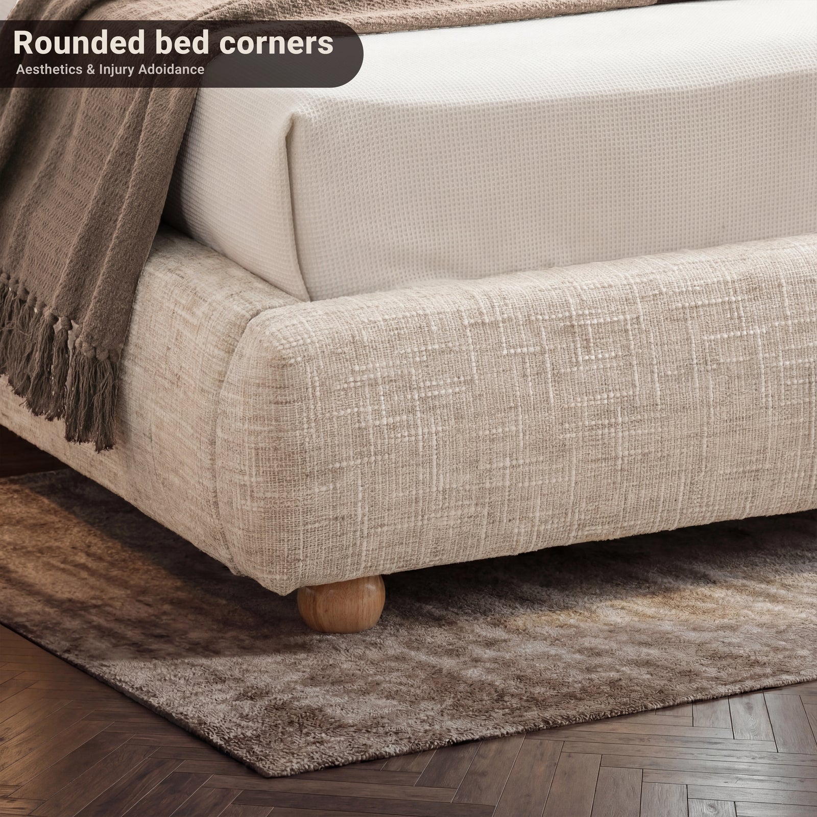 [Double | Beige] Close-up of bed frame corner showing rounded padded base with wooden ball foot on textured rug