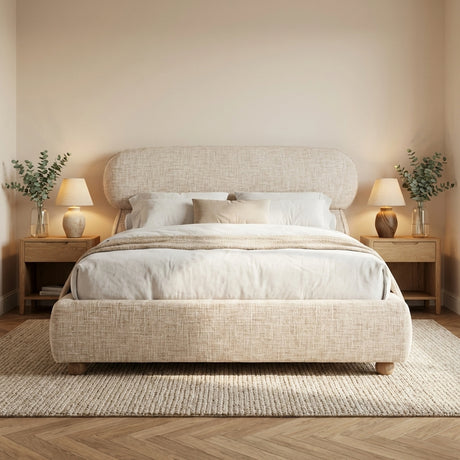 [Double | Beige] Front view of upholstered bed with pill-shaped headboard centred between matching nightstands with lamps