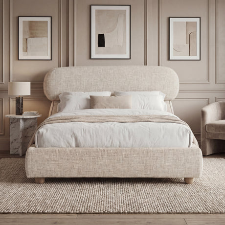 [King | Beige] Front view of upholstered bed with pill-shaped headboard centred between matching nightstands with lamps