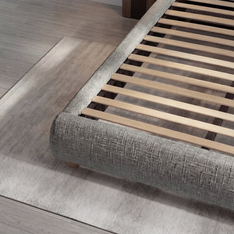 [King | Grey] Bed frame base detail with wooden slats and woven fabric corner on herringbone floor