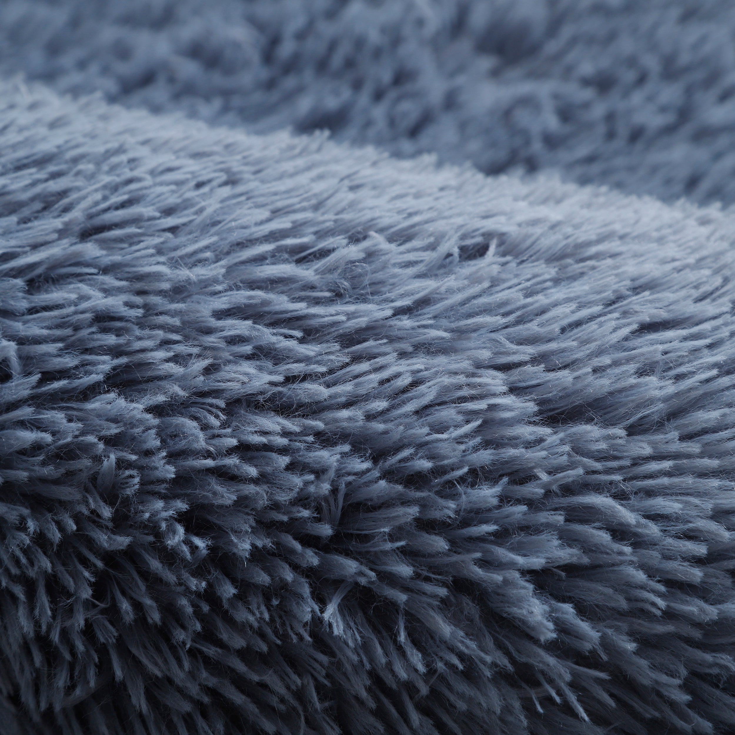 Close-up of shaggy long pile carpet with soft fluffy texture for a cozy and modern interior