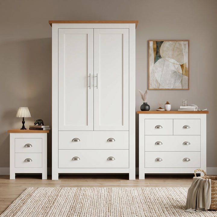 [White] Shaker white 2 door wardrobe, 4 drawer chest and 2 drawer bedside grouped on shaggy rug with oak tops