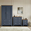[Blue] Shaker blue wardrobe, 4 drawer chest and 2 drawer bedside grouped on shaggy rug with oak tops