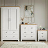 [White] Shaker white wardrobe, 4 drawer chest and 2 drawer bedside grouped on shaggy rug with oak tops