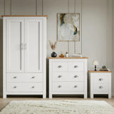 [White] Shaker white wardrobe, 4 drawer chest and 2 drawer bedside grouped on shaggy rug with oak tops